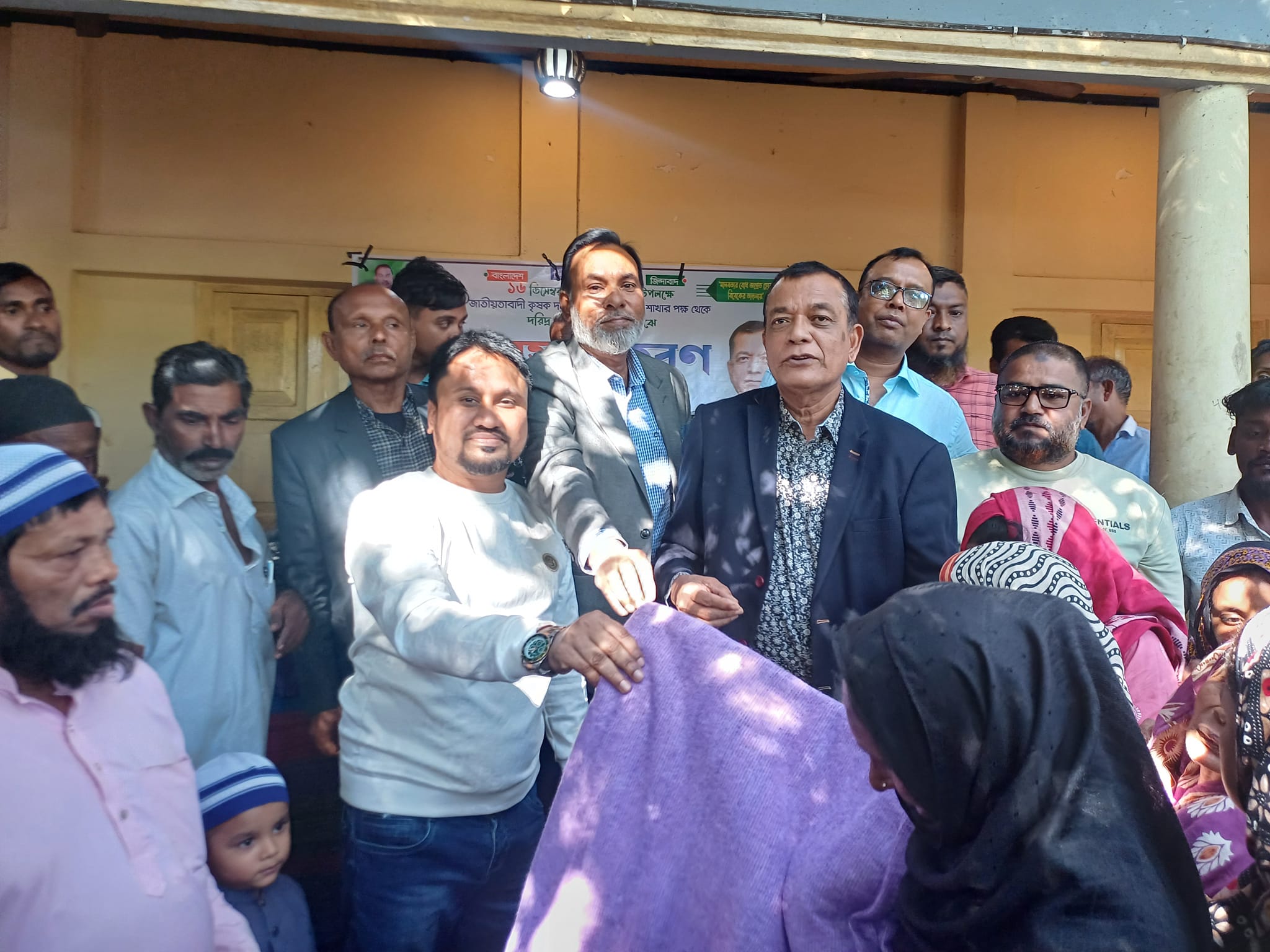 Krishak Dal distributes blankets to cold-stricken people in Srimangal