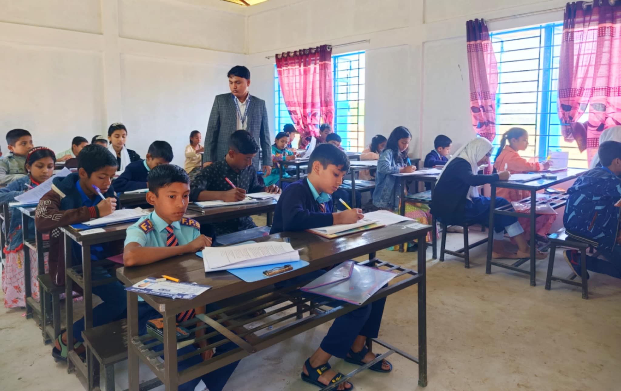 Haji Fakhrul Islam Education Trust’s Friendship Merit Scholarship Examination Completed in Jaintapur