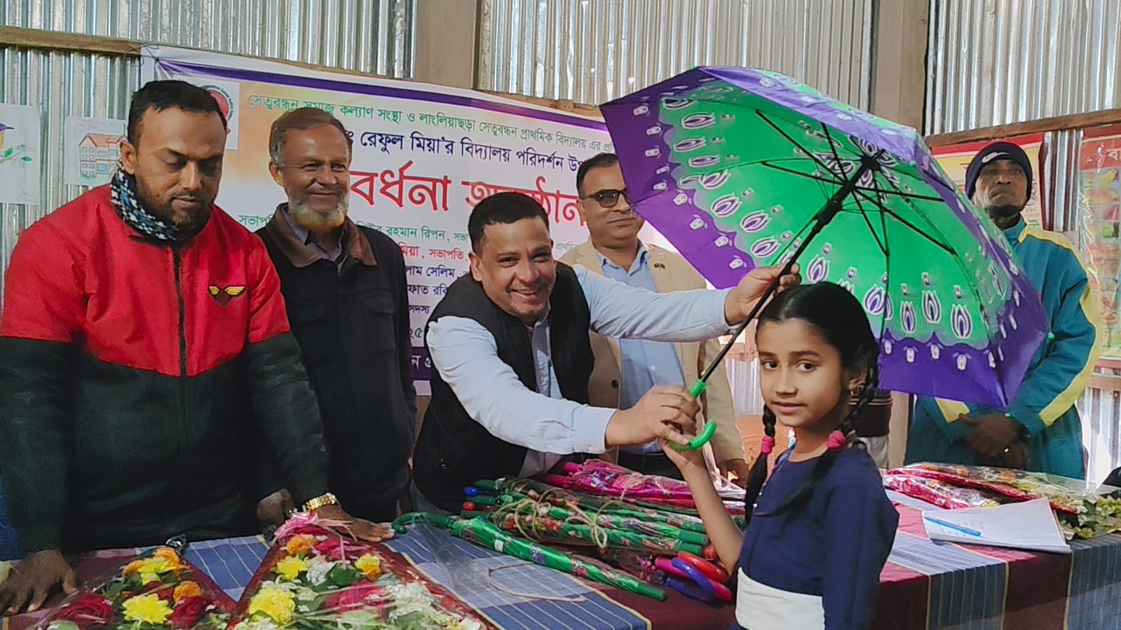 Distribution of educational materials among students in remote hilly areas of Srimangal
