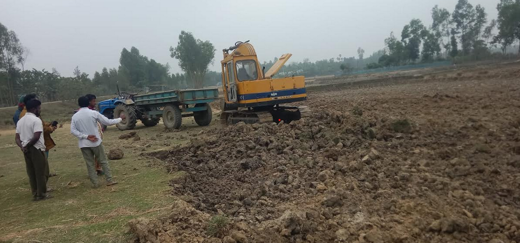 Two Awami League leaders are illegally cutting and selling cemetery soil in Rajiura