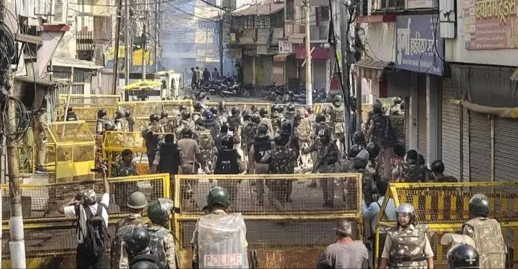 Clashes between police and protesters over mosque demolition in India